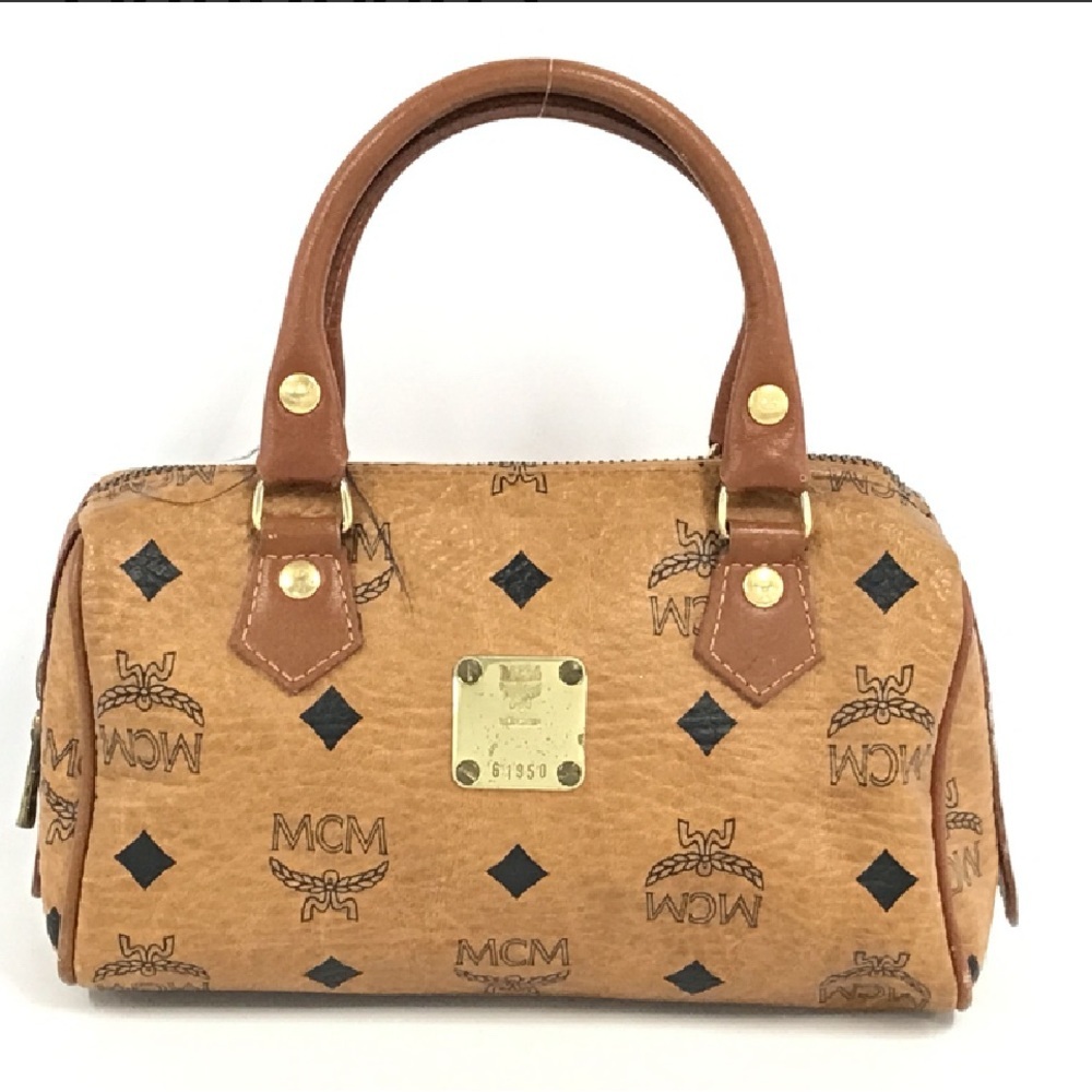 Authentic MCM Other Mini Hands Handbags